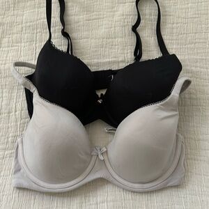 Size 32DD victoria’s Secret bras, white, and black